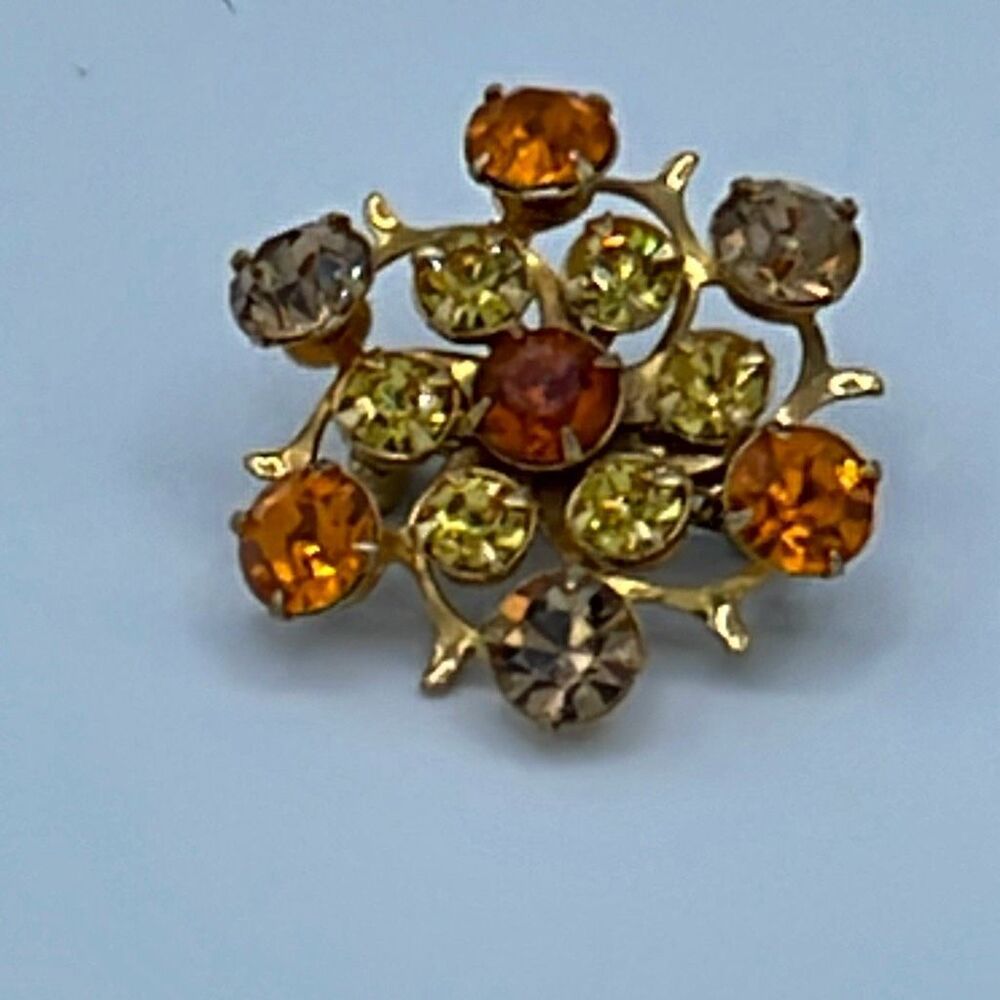 Vintage yellow, peach amber cut glass crystal brooch.